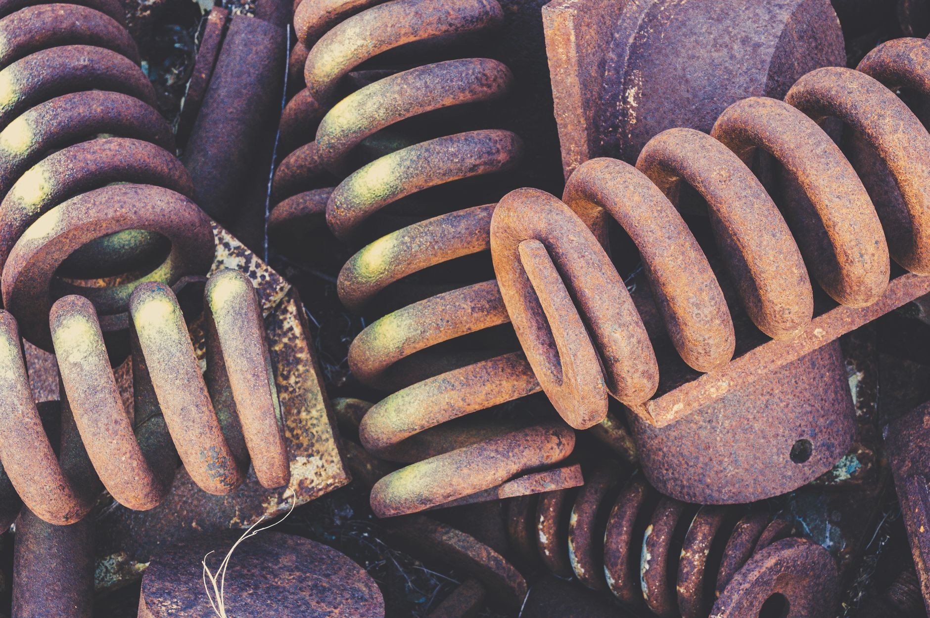 A cross-section illustration of an industrial motor revealing oversized copper coils.